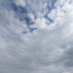 Fototapeta premium Dramatic Cloudy Sky with Puffy Cumulus Clouds and Patches of Blue Sky, Nature Background.