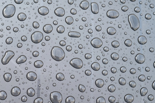 Water Drops On Smooth Surface Creating Waterproof Effect With Clear Reflections And Hydrophobic Texture Ideal For Backgrounds Moisture Protection And Rain Concept In Macro Photography High Detail