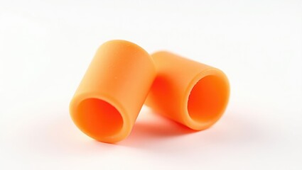 Disposable soft expandable foam earplugs on a white background, a pair of single-use uncorded and comfortable hearing protection utilized in various environments.