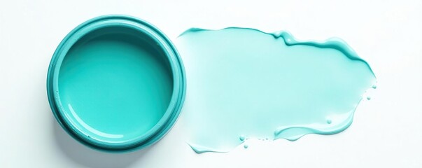 Small tin of turquoise paint isolated on white background, color, paint, art supply