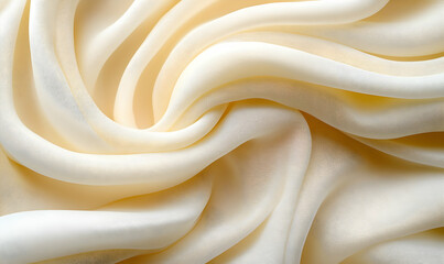 Obraz premium Soft, creamy fabric drapes in elegant swirls and folds, creating a luxurious and smooth texture