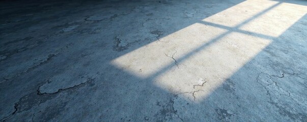 Ambient light casting intricate shadows on gray surface, shadow play, creative product presentation