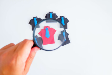 Concept of recruitment, hr, human, resource, employee, recruitment, job, manager, hiring, executive. A group of people are standing in front of a magnifying.
