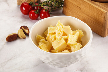 Crushed parmesan cheese in the bowl