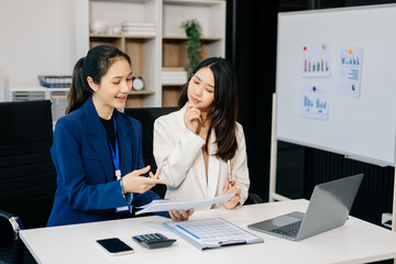 Portrait of success business people working together in office. Couple teamwork startup concept.