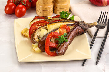Baked tomato with mozzarella and tomato
