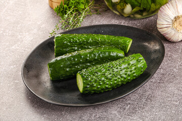 Homemade lighty salted cucumbers with herbs