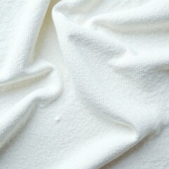 Distressed vintage white cotton fabric with intricate weave and layered folds, rustic look, woven pattern, vintage textile