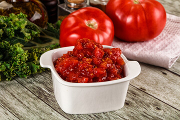 Diced ripe tomato with sauce