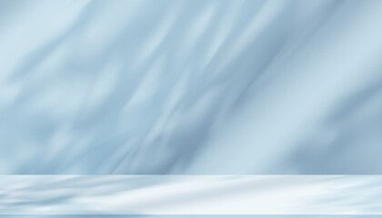 Obraz premium Light and shadow texture on blue background.Studio background and abstract sunlight effect on podium. Empty backdrop with sunlight reflection on wall and floor for product display for Spring,Summer