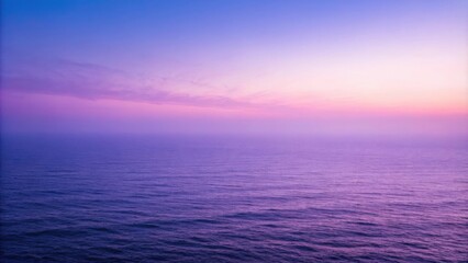 Fototapeta premium A serene seascape bathed in the hues of a soft lavender sunset, the distant horizon fading into the ethereal twilight