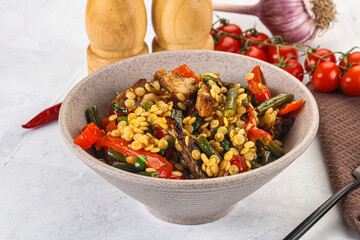 Eastern cuisine - Ptitim with beef and vegetables