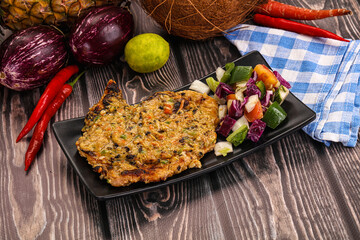 Tasty chicken steak with vegetables