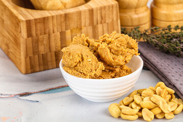 Crunchy peanut butter fat product