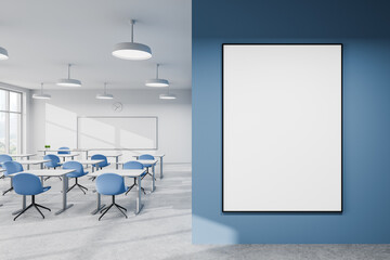 Empty poster mockup on blue wall next to classroom interior. 3D Rendering