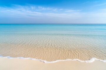 Fototapeta premium Tranquil Beach Scene with Blue Water and Gentle Waves under Sky