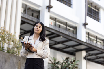 Future remote work combines technology smart phone connection online white digital business woman...
