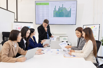 Group of business people working plan analysis at desk in modern office, Documents discussion analysis data the charts graphs, Business financial information and accountant concept.