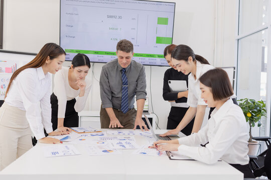 Business team working together, Group of business people working plan analysis at desk in modern office, Documents discussion analysis data the charts graphs, Business financial information,