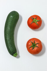 Organic products. Zucchini and tomatos.
