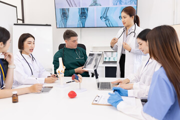 Fototapeta premium Team of doctor with human model and orthopedic surgeon, Healthcare and medical concept.