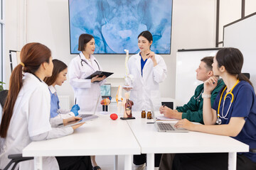 A group of doctors working together as a team in a hospital or clinic, Orthopedist doctor team, Healthcare and medical concept.