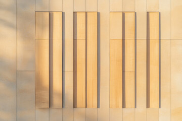 Architectural design featuring textured wooden panels on a contemporary wall