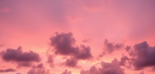 Obraz premium Soft, blush pink sunset sky with fluffy clouds, romantic ambiance, romantic, tender