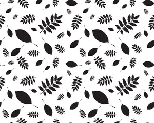 Seamless pattern with silhouettes of foliage on a white background