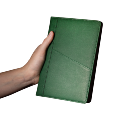 Holding a green notebook planner, daily agenda for scheduling and organizing events. Business, office, and meeting reminder concept. Isolated on white background..