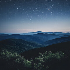 A mountain range with a clear blue sky and stars