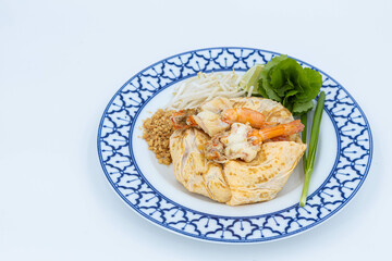 Prawn Pad Thai, Fried noodle Thai style with prawns, Fried Thai Noodle with Shrimp Wrapped in Egg on white background, Thaifood