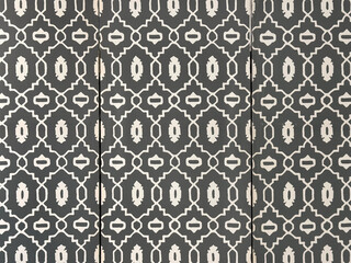 Fabric texture in random middle east pattern, in black and white color. Abstract Arabian and middle eastern ornamental pattern. Suitable for wall paper and fabric. Seamless background texture.