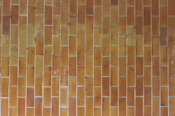 Wide cream brick wall with beige, old brown brick and limestone textures, perfect for abstract backgrounds
