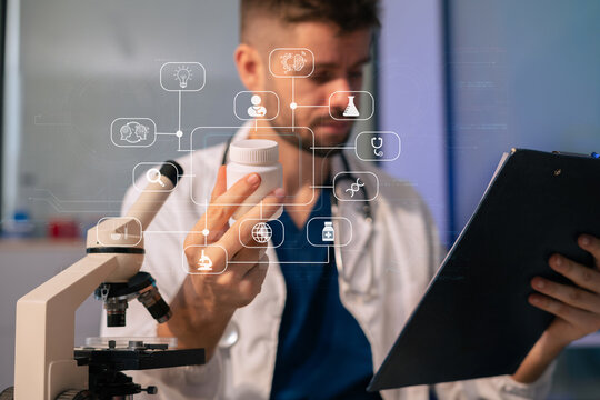 Doctor analysis the blood test examination results and medication usage of the patient on the chart, medical check-up concept.
