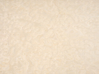 Warm taupe and soft cream hues intermingle in the unique pattern of this high-quality maple burl wood veneer
