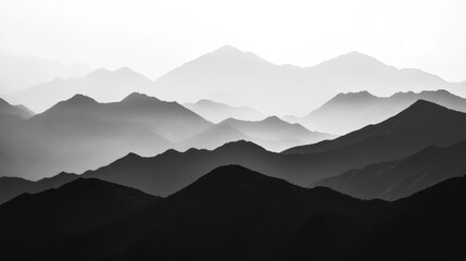 Serene grayscale mountain range.