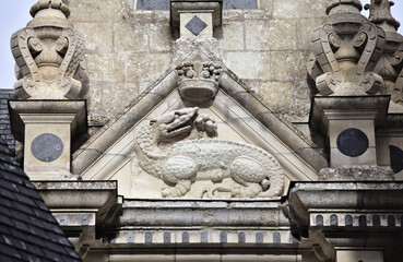 Detailed stone carving of a dragon at Chamborg castle, France