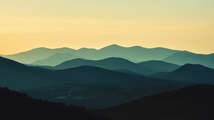 Fototapeta premium Serene sunset over rolling hills.