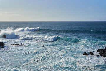 Waves crashing on a rocky coastline........