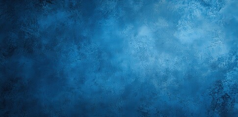 Obraz premium A textured blue background with a soft gradient, evoking a calm and serene atmosphere.