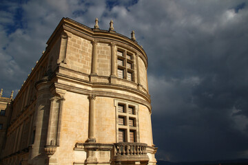 The tower of the south wing of Grignan Castle seen under a stormy sky from the southwest terrace...