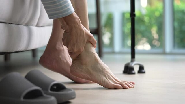 Senior woman suffering from pain in ankle and foot