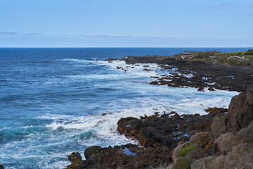 Rocky coastline with crashing waves
