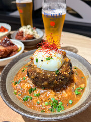 Vegetarian hamburger with poached egg