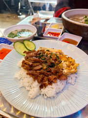 Cambodian sliced pork and egg on rice