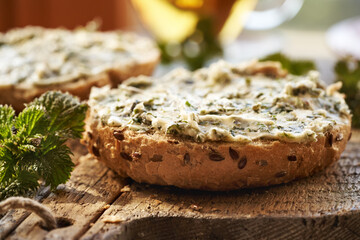 Nettle butter - homemade bread spread made of wild edible plants collected in early spring