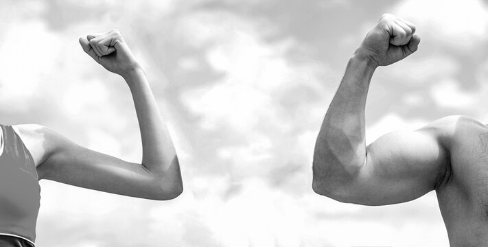 Rivalry, vs challenge strength comparison. Muscular arm vs weak hand. Black and white
