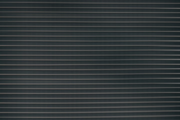 Obraz premium Minimalist Horizontal Metal Shutter with Repetitive Lines