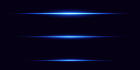 Blue horizontal line of light, flare of a light beam. On a black background.